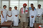 H.E. in a group photograph with members of Brahma Kumaris, Itanagar after Raksha Bandhan programme at Raj Bhawan