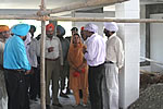 First couple inspecting the under construction Gurudwara building at Naharlagun