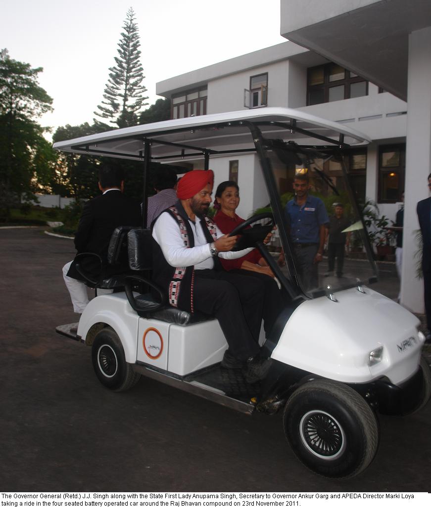 Governor General(Retd.) along with the State First Lady Anupama Singh, Secretary to Governor Ankur Garg and APEDA Director Marki Loya taking a ride in the four seated battery operated car around the Raj Bhavan compound:23/11/2011