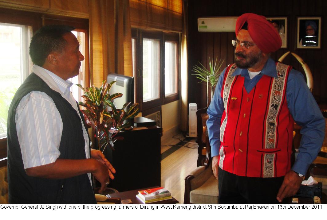 Governor General JJ Singh with one of the progressing farmers of Dirang in West Kameng district Shri Bodumba at Raj Bhavan:13/12/2011