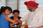 Students of Vivekananda Kendra Vidyalaya, Itanagar tying Rakhi to Governor on the occasion of Raksha Bandhan at Raj Bhavan, Itanagar:14/08/2011