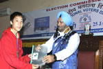 Governor handing over EPIC to a newly enrolled electorate on the occasion of the National Voters’ Day celebration at Banquet Hall, Itanagar: 25/01/2011