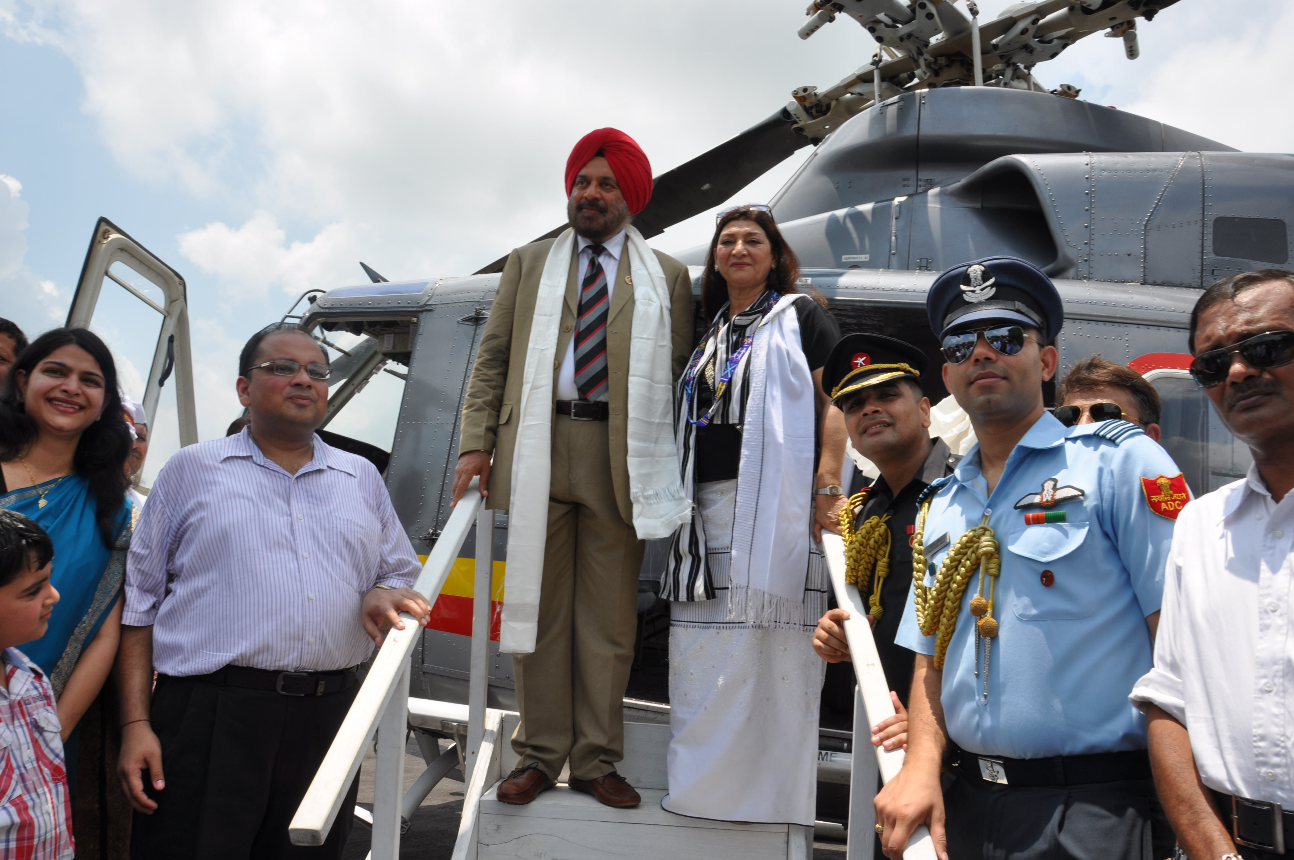 Outgoing Governor Gen (Retd) J.J. Singh and First lady of the State Smti Anupama Singh before taking off from Raj Bhawan Helipad, Itanagar:27/05/2013