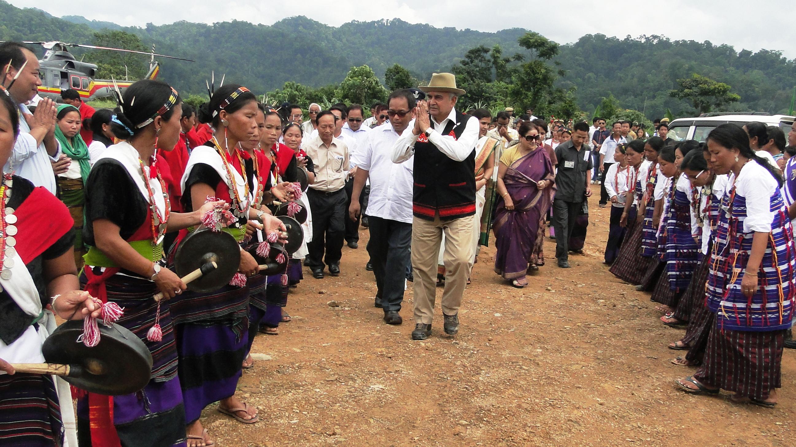 The Governor of Arunachal Pradesh Lt. Gen (Retd) Nirbhay Sharma and First Lady of the State Smti Jyotsna Sharma accorded traditional reception by cultural troupes at Jairampur:06/06/2013.Also seen: Shri Setong Sena, minister and local MLA.