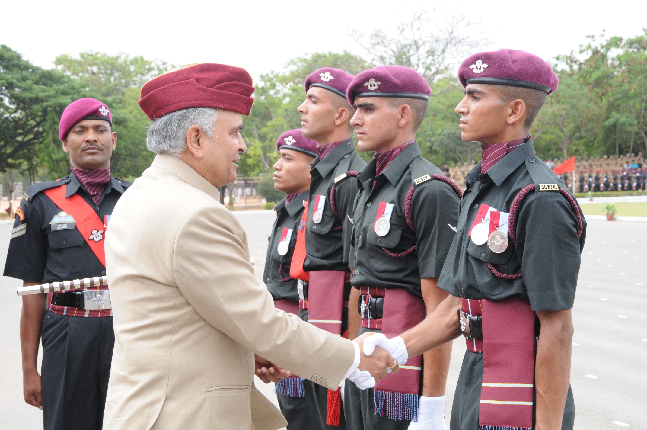 The Governor of Arunachal Pradesh Lt. Gen (Retd) Nirbhay Sharma with awardees among the newly inducted personnel of Parachute Regiment at Parachute Regimental Training Centre, Bangalore:22/06/2013