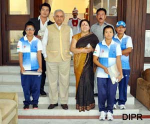 Governor and First Lady of the State with sports achievers of the State at Raj Bhawan, Itanagar on 11th November 2013