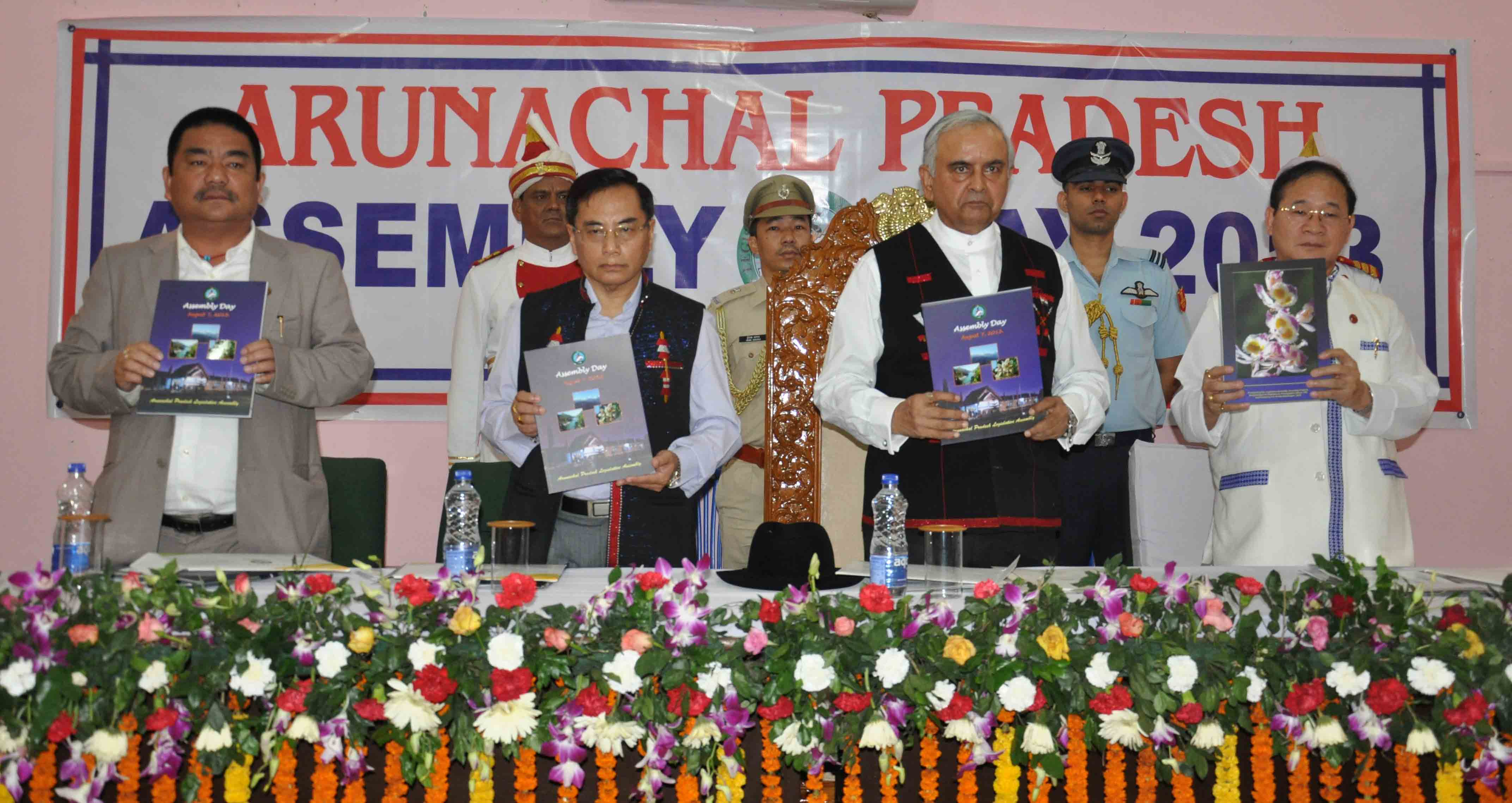 Governor with CM, Speaker and Deputy Speaker releasing the Assembly Day Souvenir on the occasion of Assembly Day celebration.Naharlagun :- 07/08/2013