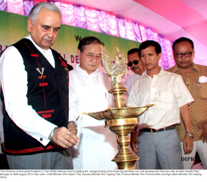 The Governor of Arunachal Pradesh Lt. Gen (Retd) Nirbhay Sharma lighting the  inaugural lamp of the three-day job Mela cum skill development interview rally at Indira Gandhi Park, Itanagar on 30th August 2013. Also seen: Chief Minister Shri Nabam Tuki, Industry Minister Shri Tapang Talo, Finance Minister Shri Chowna Mein and Agriculture Minister Shri Setong Sena