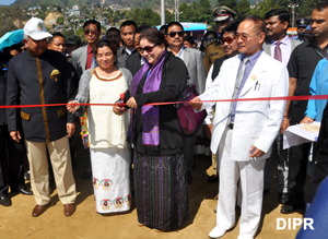 First Lady of Arunachal Pradesh Smt Jyotsna Sharma inaugurating the Food Festival on the occasion of 28th Statehood Day celebration at Indira Gandhi Park, Itanagar on 20th February 2014. Also seen: Governor Lt. Gen (Retd) Nirbhay Sharma, Chief Minister Shri Nabam Tuki and his wife.