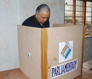 The Governor of Arunachal Pradesh Lt Gen (Retd) Nirbhay Sharma casting his vote at Government Middle School building, P Sector, Itanagar on 9th April 2014