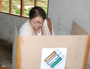 The First Lady of the State Smt Jyotsna Sharma casting her vote at Government Middle School building, P Sector, Itanagar on 9th April 2014