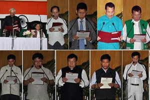 The Governor of Arunachal Pradesh Lt. General (Retd) Nirbhay Sharma administrating the oath of office and secrecy to the ministers at Darbar Hall, Raj Bhawan, Itanagar on 1st June 2014