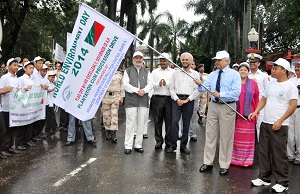 The Governor of Arunachal Pradesh Lt. Gen (Retd) Nirbhay Sharma flagging off a rally Clean & Healthy Environment from Raj Bhawan, Itanagar on 5th June 2014