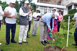 The First Lady of the State Smt Jyotsna Sharma taking part in plantation programme on the occasion of World Environment Day celebration at Raj Bhawan, Itanagar on 5th June 2014