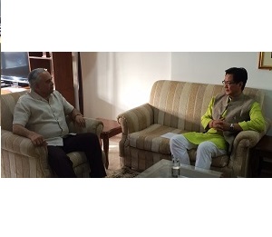 The Governor of Arunachal Pradesh Lt. Gen (Retd) Nirbhay Sharma with the Union Minister of State (Home) Shri Kiren Rijiju at New Delhi on 10th June 2014