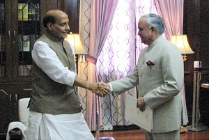 The Governor of Arunachal Pradesh Lt. Gen (Retd) Nirbhay Sharma with Union Minister (Home Affairs) Shri Rajnath Singh at New Delhi on 11th June 2014