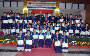 Governor of Arunachal Pradesh Lt. Gen (Retd) Nirbhay Sharma with the recipients of Bharat Scouts and Guides Rajya Puraskar at Raj Bhawan on 10th January 2014.