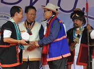 The Governor of Arunachal Pradesh Shri JP Rajkhowa felicitating one of the senior community members on the occasion of Solung Festival in the Mopin Solung Ground, Itanagar on 1st September 2015