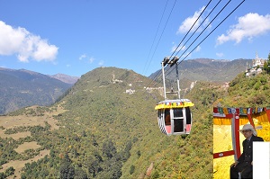 The Governor of Arunachal Pradesh Shri JP Rajkhowa taking a cable car ride in the Tawang Rope-way, laid between Tawang Monastery to Gyangong Ani Gompa at Tawang on 26th October 2015