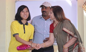 The First Lady of the State Smt Neelam Mishra giving prize to the best student of Donyi Polo Mission School for the Hearing and Visually Impaired during the World Day for the Disabled celebration, Chimpu, Itanagar on 3rd December 2017.